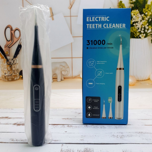 Портативная ультразвуковая зубная щетка - скайлер Electric Teeth Cleaner 31000/min (чистка зубов, удаление зубного камня, 5 режимов работы, 4 насадки)